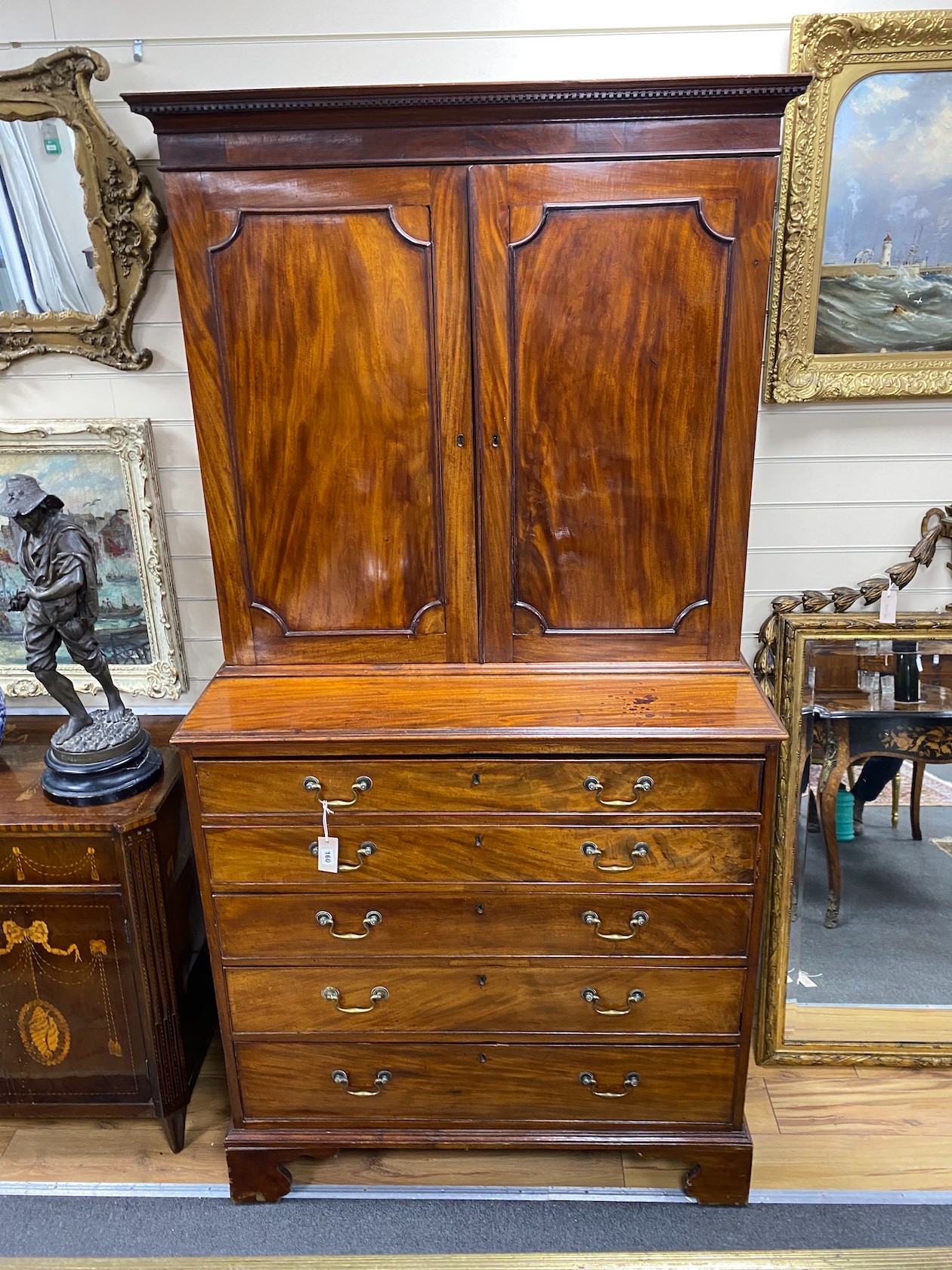 A George III mahogany secretaire cabinet, width 108cm, depth 56cm, height 213cm